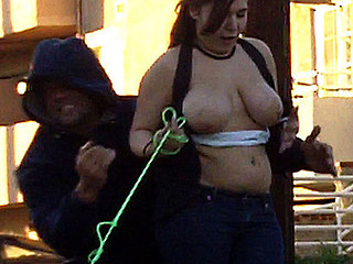 So this cutie with a tiny dog and huge fucking knockers comes walking up the street in a TUBE TOP! Everyone knows those are just meant to be pulled down! Her boobs were just begging to bust out of that constricted top so we helped 'em out!