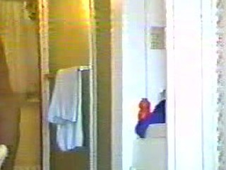 Spy-camera is set up right in front of bathroom's door. Naked woman enters it and becomes part of our great raunchy collection.